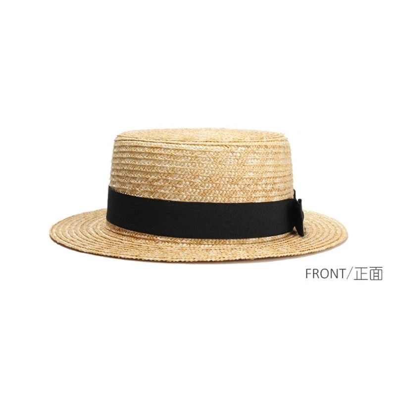 Front view of flat top wheat straw hat with black band